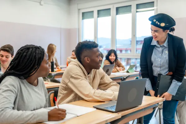 university-teacher-helping-students-studying-with-2025-03-22-19-34-54-utc-69318fe5e9ee9